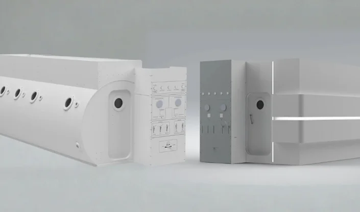 A digital rendering of two large versions of the Titan hyperbaric oxygen therapy (HBOT) chamber: the circular Omega (white) on the left and the more rectangular Square on the right. Both have buttons and panel details, displayed side by side on a plain gray background.